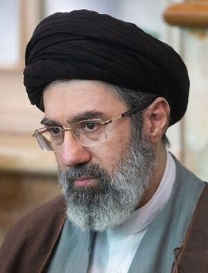 Khameini, age 48, in clerical clothing